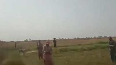 Pakistani locals shoot at drones