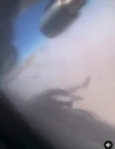 [NSFL] USAF C-17 flies away from Kabul while the lifeless remains of an Afghani flap in the turbulence