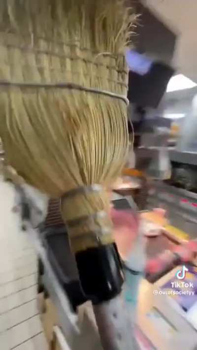 Guy shoves a broom in the deep fat fryer in McDonalds