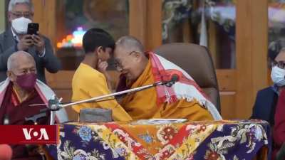 Why did the Dalai Lama kiss this young boy on the lips then tell him to "Suck my tongue"?