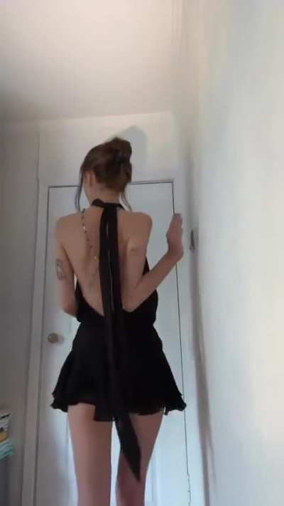 Katie in backless black mini dress getting ready for the Christmas party 🎄🎅🎉🐈‍⬛ 🖤