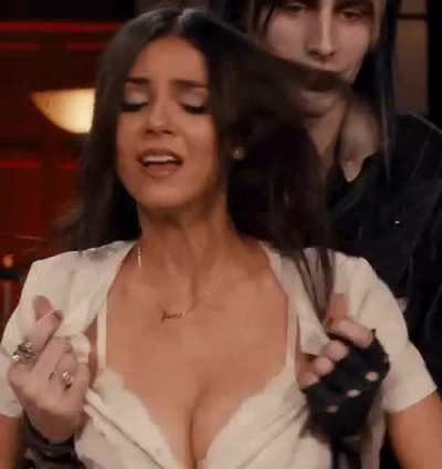 Ripping her shirt