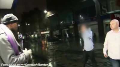 Couple of Scottish racists start a fight with a busker and get put on their arses.