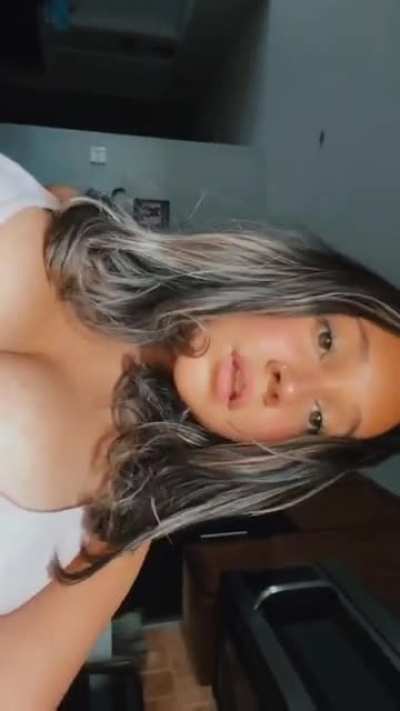This teens shirt is fighting for its life holding back her huge milkers