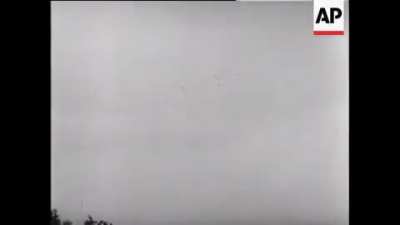 Germans fire on Airborne troops and British gliders during Operation Market Garden in Sept. 1944