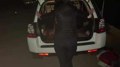 [F]loud farts in car trunk outside