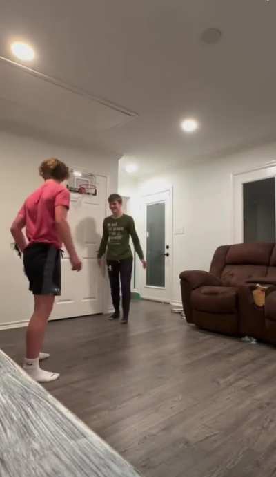 Kid puts hole in wall, well attempting a &ldquo;basketball&rdquo; dunk.