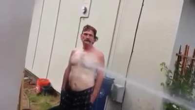Drunk Neighbour Gets The Hose