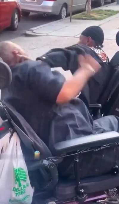 Wheelchair dudes going at it...