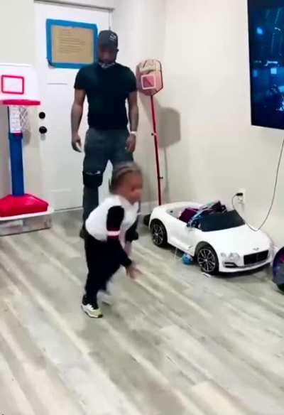 Dad Blocks toddler from shooting a basket and toddler isn&rsquo;t having any of it