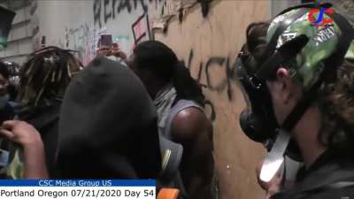 BLM stops Portland rioters from attempting to burn down courthouse "You are not helping BLM you are helping yourself"