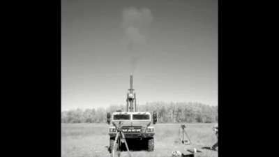 Mack Sherpa light utility vehicle mounting a 105mm howitzer operating on the "soft recoil" principle