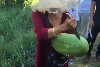 Mongolian way of cutting watermelon