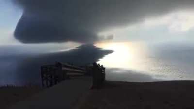 A beautiful roll cloud over Lake Michigan immortalized by Ken Temple