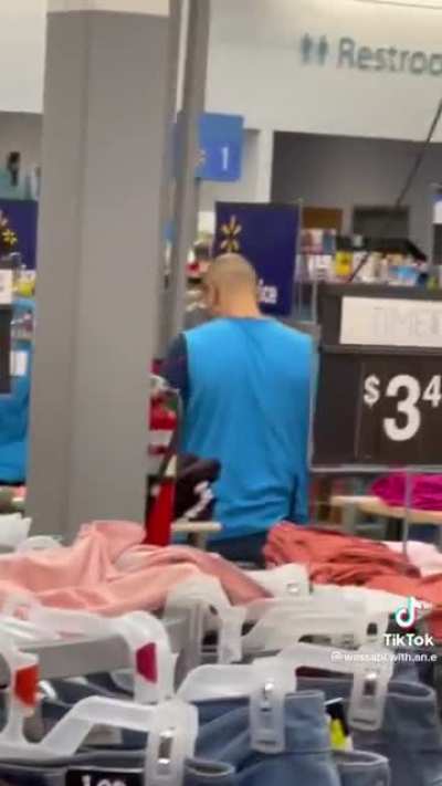 Lady loses it in Walmart and makes a mess for some unknown reason