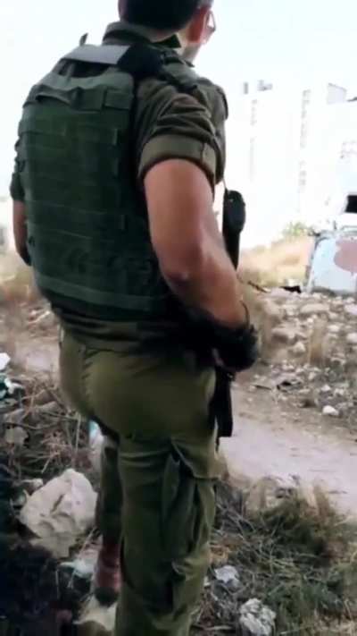 Documented before this phase of the ethnic cleansing of Palestine. A Palestinian man chides an idf soldier who travelled from Ukraine to help occupy another land.