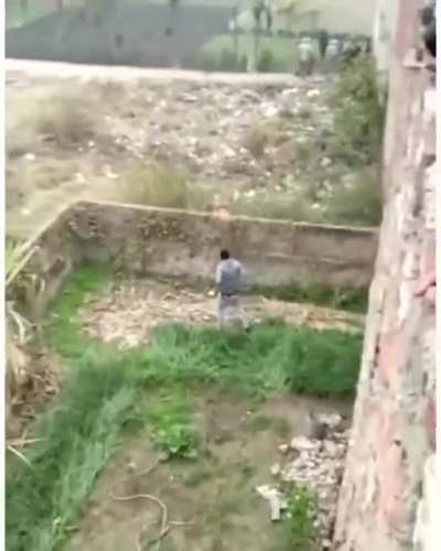 Leopard bulldozing through an Indian village.