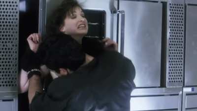 Tina Cote Squeezes a Man&rsquo;s Balls and Knees Him in the Groin in Mean Guns (1997)