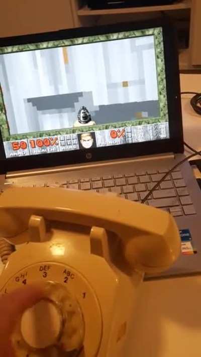Playing DOOM with a rotary phone "gamepad" (pro micro)
