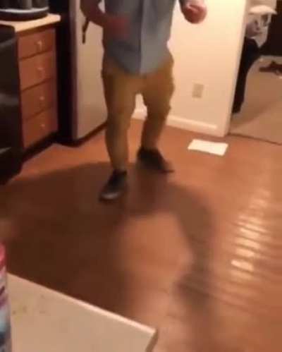 trying to smash a bottle on the floor?