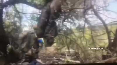 Russian soldier hit by grenades during Ukrainian trench clearing
