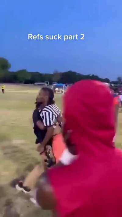 Short ref having a meltdown on field