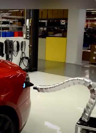 Концепт автоматического зарядного устройства "змейки" от Tesla