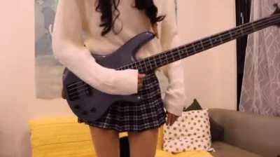 Following anime girl bass player