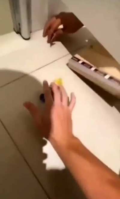 Skateboarding in the bathroom