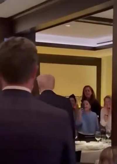 Trump's first time going out to eat at a restaurant in Washington DC last night as protesters chant "Trump is the Hitler of our time!"