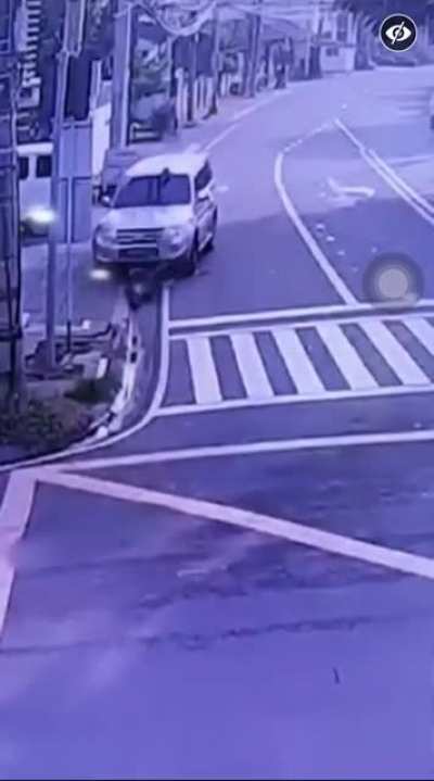 Asshole driver runs over poor street sweeper in the Philippines