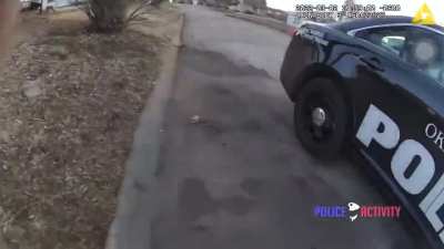 Suspect shooting Oklahoma cop at close range.