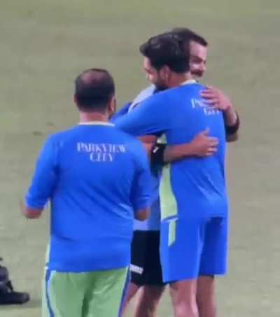 Plot twist- They’re trying to feel up each other’s muscles to know what extraordinary shot/ball to hit/bowl