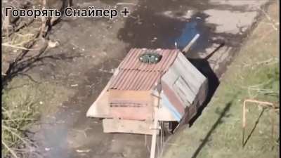 Russian tank with a roof on it to protect against drone strikes