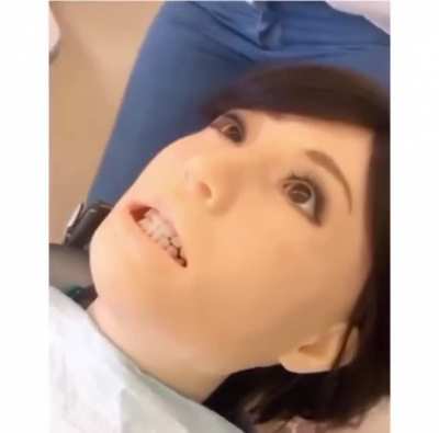 A malfunctioning dental school robot