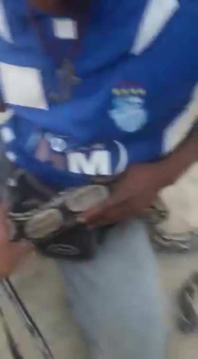 WCGW playing with a snake