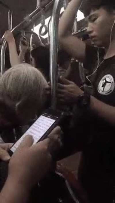 The kid on the right, places his hand between the rail and Grandma's head so, doesn&rsquo;t bump to the railing.