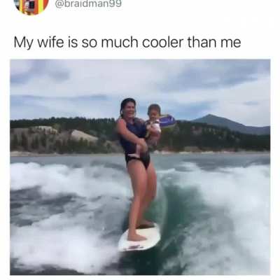 Mom carrying her baby while surfing 🤯