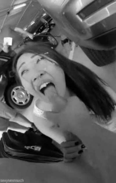 Asian cumslut taking a huge load in public in a parking garage.