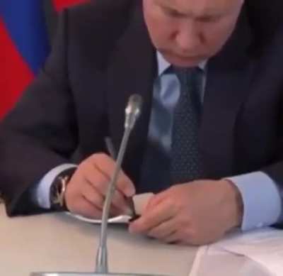 Putin taking very important notes about the health situation in Russia.