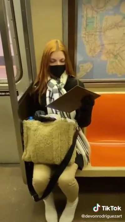 Painting a stranger on the subway results in surprise followed by tears of happiness