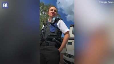 Man draped his car in a Palestinian flag while waiting to pick up his sister from school. Zionist Karen shows up, harasses him and calls the cops. Ten officers show up in six cars, and fine him for causing 'harassment and distress'