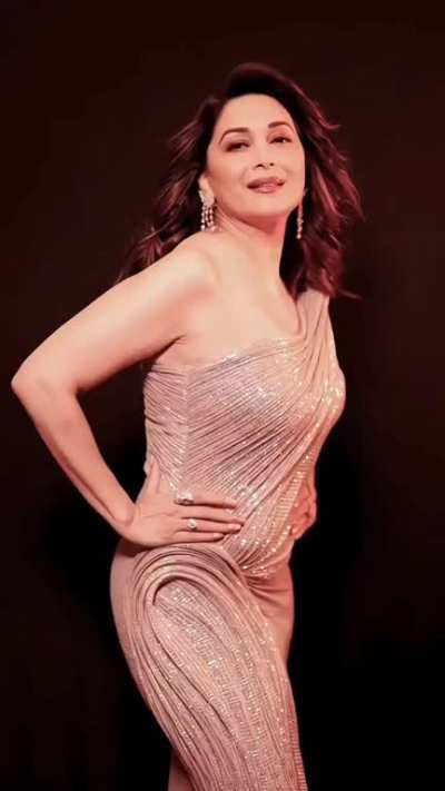 Madhuri Dixit - Stunning whore in one-shoulder dress