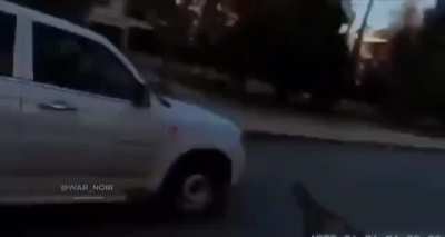 Syrian opposition fighter strikes a SAA officer in a truck with a RPG during the clashes of Aleppo, from the recent offensive 