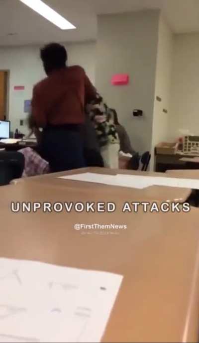 Girl attacks another girl with chair while she isn&rsquo;t paying attention