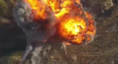 Russian armored vehicle hit by FPV explodes, sending soldiers flying