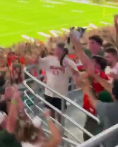 Fans Catch Falling Cat During UM Football Game