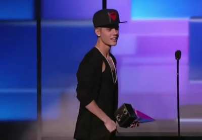 Jenny McCarthy sexually harassing Justin Bieber and grabbing his butt on live TV.