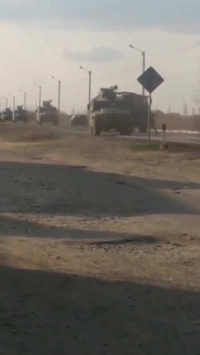 Drunk Ukrainian tries to stop russian vehicles.