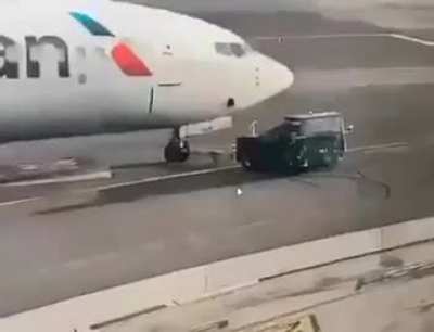 Tow Truck Driver gets Cabin Rammed By Airplane. Driver Unharmed.